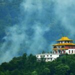 A scenic view of one of the best monasteries in Siliguri with lush greenery and landscapes.