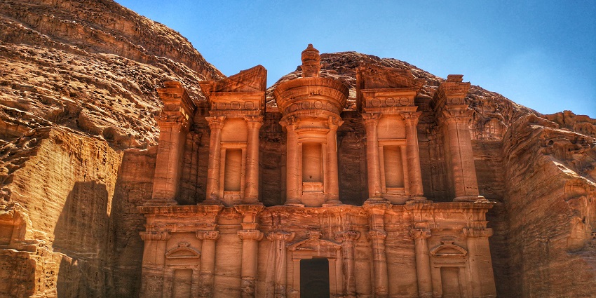 Places to visit in Jordan feature rock-cut monastery with panoramic views in Petra.