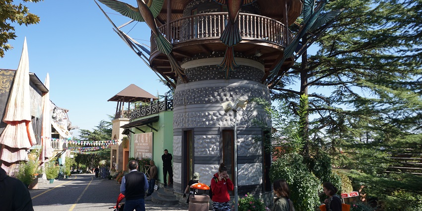 Charming amusement park on a hilltop offering views and entertainment in tbilisi.