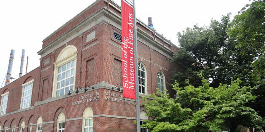 The Museum of Fine Arts with a name banner in the front surrounded by trees