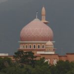 A picture of Nakhoda Mosque in Kolkata, showcasing its grand architectural design.