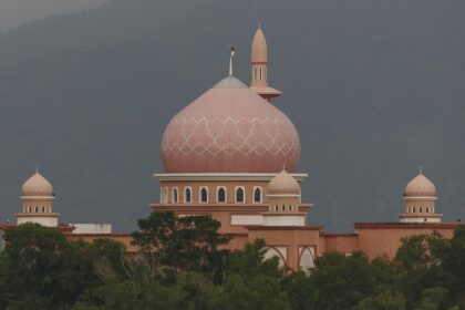 A picture of Nakhoda Mosque in Kolkata, showcasing its grand architectural design.