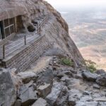 An image of the Naneghat trek offers a lot of scenic views, with lush greenery.