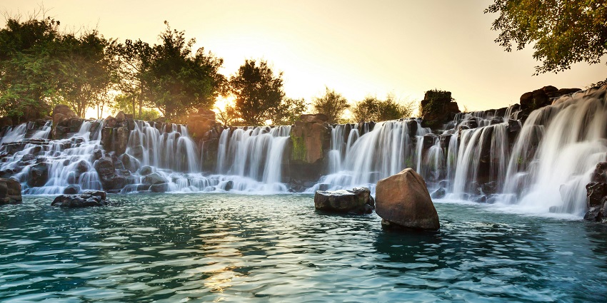 An image of Nanhe Ghat Waterfalls, a refreshing stop during the Sandhan Valley trek.