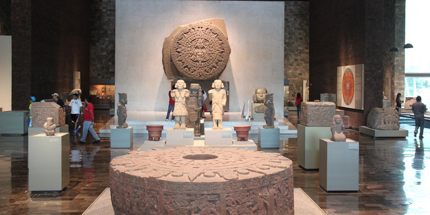 The inside view of the National Museum of Anthropology showcasing ancient artefacts.