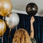 Image of a woman decorating a room for new year parties in Kolkata