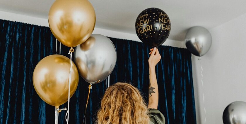 Image of a woman decorating a room for new year parties in Kolkata