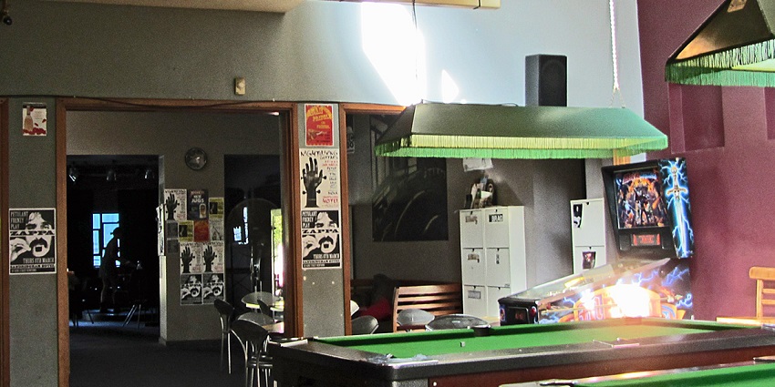 Bohemian neighborhood known for bars and live music in Sydney nightlife.
