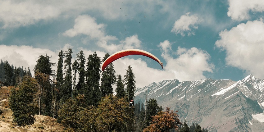 Paragliding in Interlaken offers breathtaking views of Swiss landscapes.