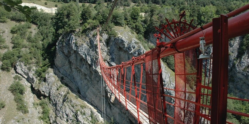 Niouc Suspension Bridge, a dramatic suspension bridge crossing a deep gorge in the Alps