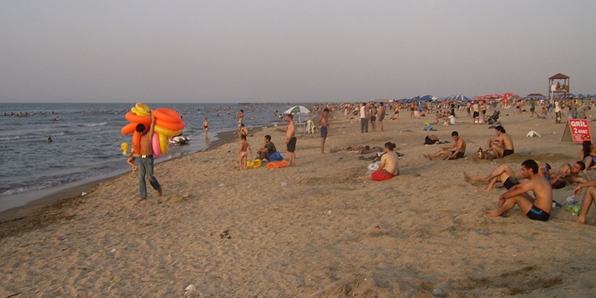Quiet beach offering clear blue waters and a peaceful atmosphere in Azerbaijan.