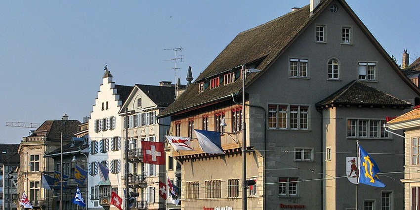 Historic district with narrow streets, medieval buildings, and culture in old town Zurich.