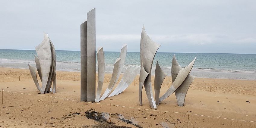 Famous WWII site with memorials and expansive sandy beaches in Paris, France