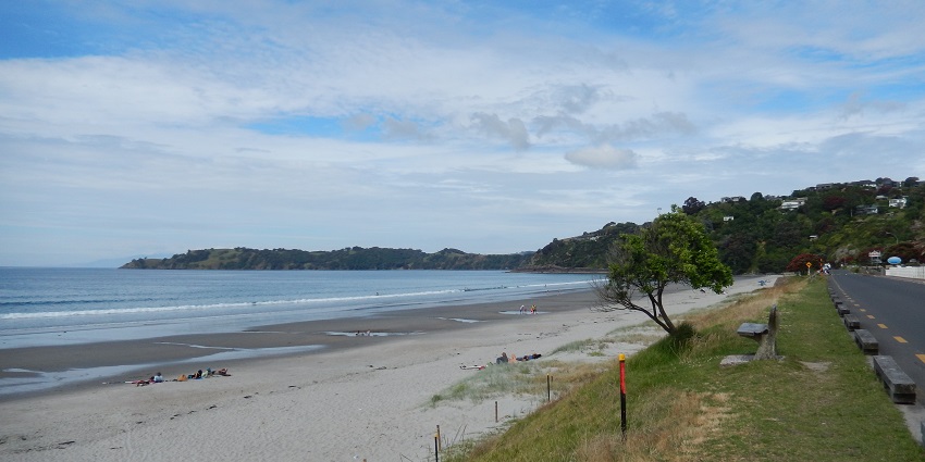 A serene view of Onetangi Beach located on Waiheke Island in New Zealand
