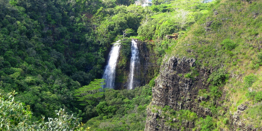 An image showing a view of the Opaeka’a Falls, one of the best Kauai waterfalls.