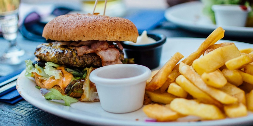 Image of a plate of burger and fries on the side - enjoy food in the Open House cafe