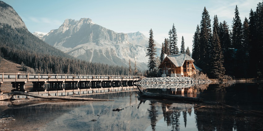 Scenic image of a cabin near the water body in the national park in British Columbia