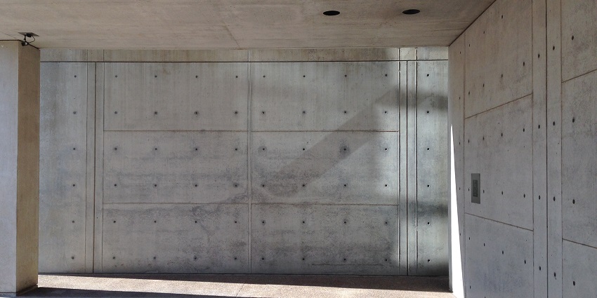 An image of the exterior of the Kimbell Museum, showing its concrete architecture