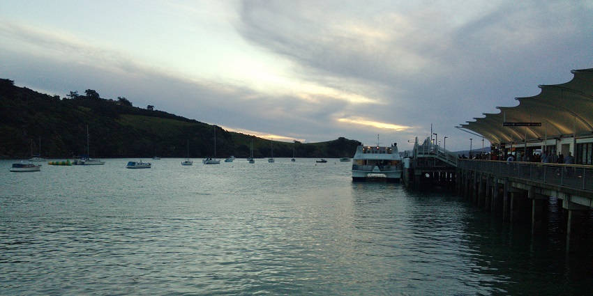 A beautiful view of tourists enjoying the ferry ride on the island in New Zealand