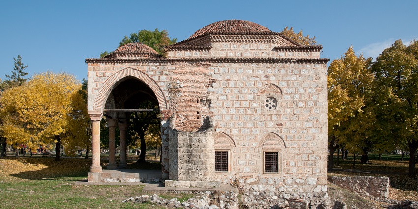 An image of visitors exploring the tranquil surroundings of Kadam Rasul Mosque.