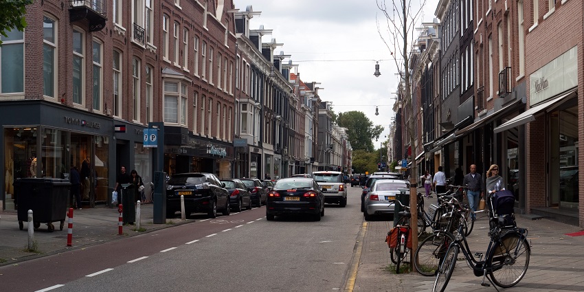 Shopping in Amsterdam street with luxury brands, designer boutiques, and fashion.