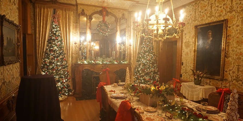 Christmas decorations inside the Pabst Mansion, featuring a tree and festive decor.