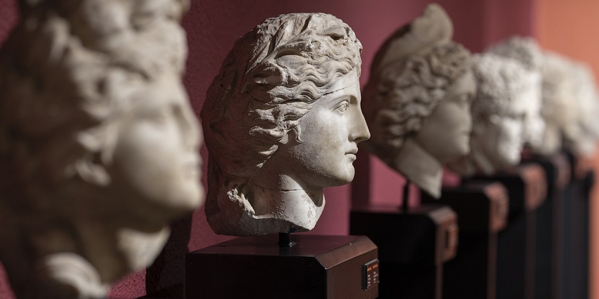 A collection of Roman marble busts, showcasing the diverse styles of Roman portraiture