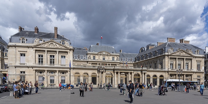 Historic palace with beautiful gardens, arcades, and cultural significance.