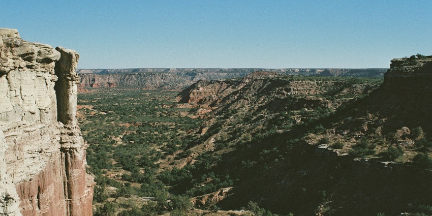 The visitor centre parking picture taken from inside the Palo Duro Canyon State Park.