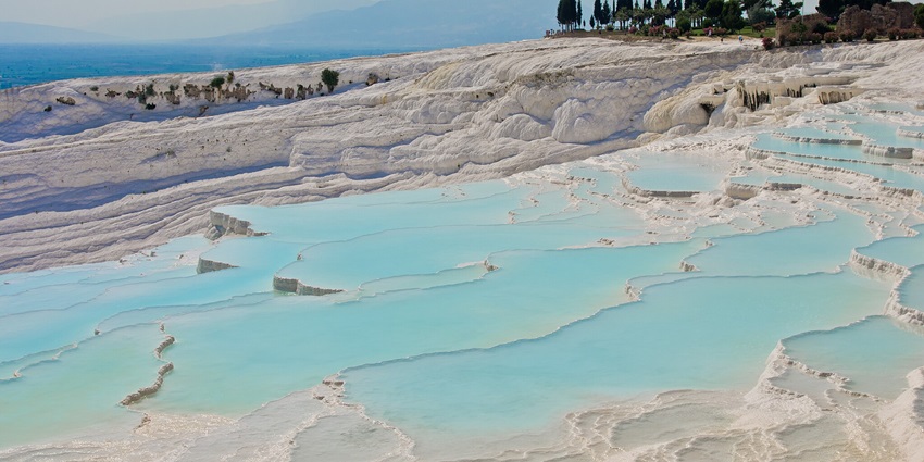 White limestone terraces and thermal pools in Turkey hot springs paradise.