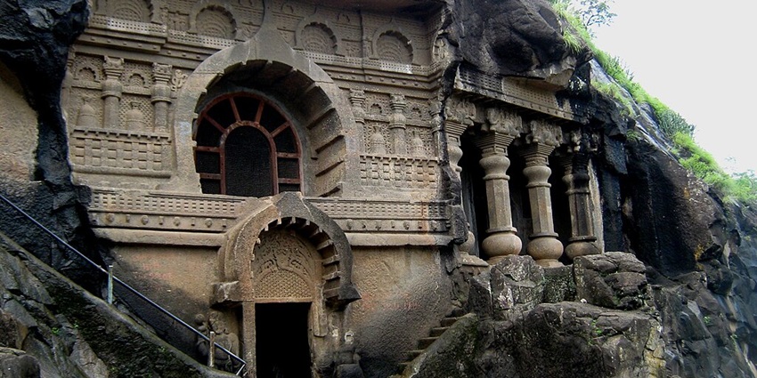Intricate carvings on the walls of the Pandavleni caves, near the Gondeshwar temple