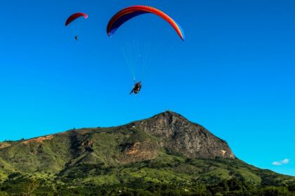 A picture of a paraglider enjoying the adventure during paragliding in Kalimpong