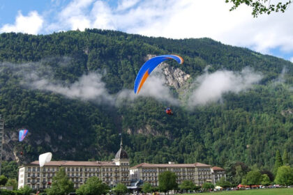 Paragliding in Interlaken offers breathtaking Swiss alpine views.