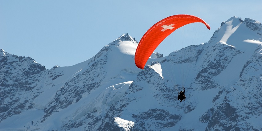 Thrilling paragliding adventure over stunning mountains and alpine valleys.