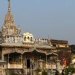 An image of the majestic PareshnathTemple showcasing its intricate carvings and spires