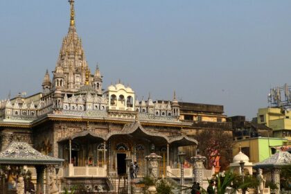 An image of the majestic PareshnathTemple showcasing its intricate carvings and spires