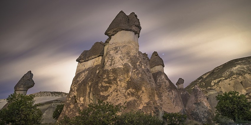 Fascinating fairy chimneys and rock formations in scenic valley.