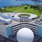 View of the Frost Science Museum's white, futuristic buildings from MacArthur Causeway.