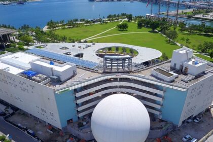 View of the Frost Science Museum's white, futuristic buildings from MacArthur Causeway.