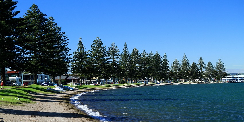 Sunbathe at Pilot Bay Beach at Mount Maunganui in the scenic settings of New Zealand