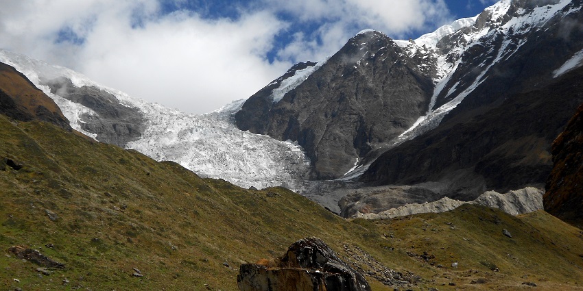 Trekking in Uttarakhand leading to the picturesque Pindari Glacier's base.