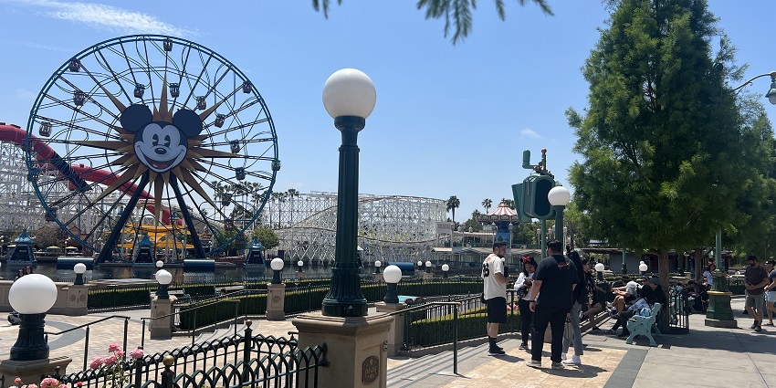 Colourful attractions and Ferris wheel at Pixar Pier, a popular place near Disney California Adventure Park