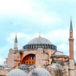 The places to visit in Istanbul include historical landmarks and a modern skyline.