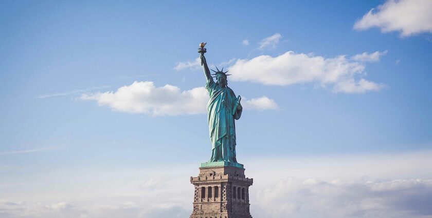 Statue of Liberty in New York under cloudy white - places to visit in july in the USA