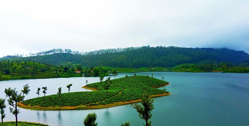 A picture of a serene lake, showcasing some of the top places to visit in Valparai.