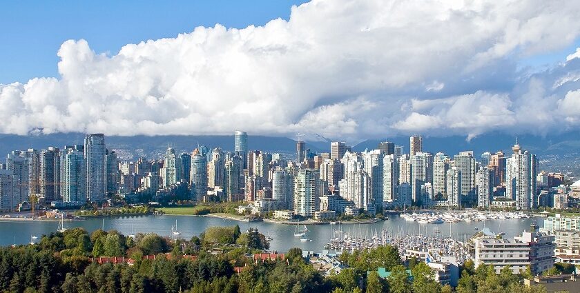 A distant view of the downtown Vancouver skyline showcasing various skyscrapers