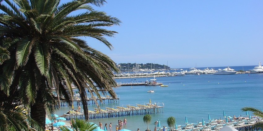 A lively beach, known for its golden sands and water activities.