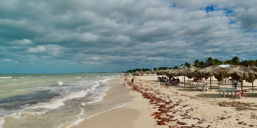 A scenic view of beautiful beaches in Mexico with clear blue waters and golden sand.