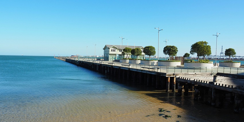 Close to the city, Port Melbourne Beach boasts sandy shores and stunning sunset views.