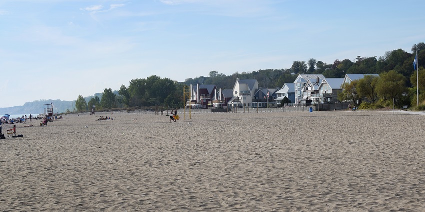 A view of golden sands and blue waves at Port Stanley - one of the beaches near Toronto.